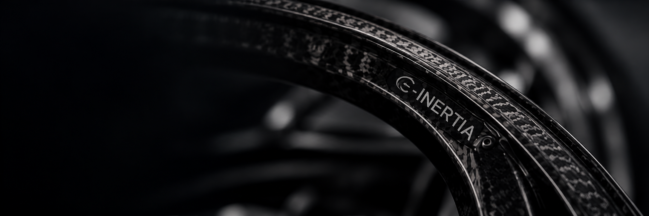 Close-up of a C-INERTIA carbon wheel rim with a satin finish